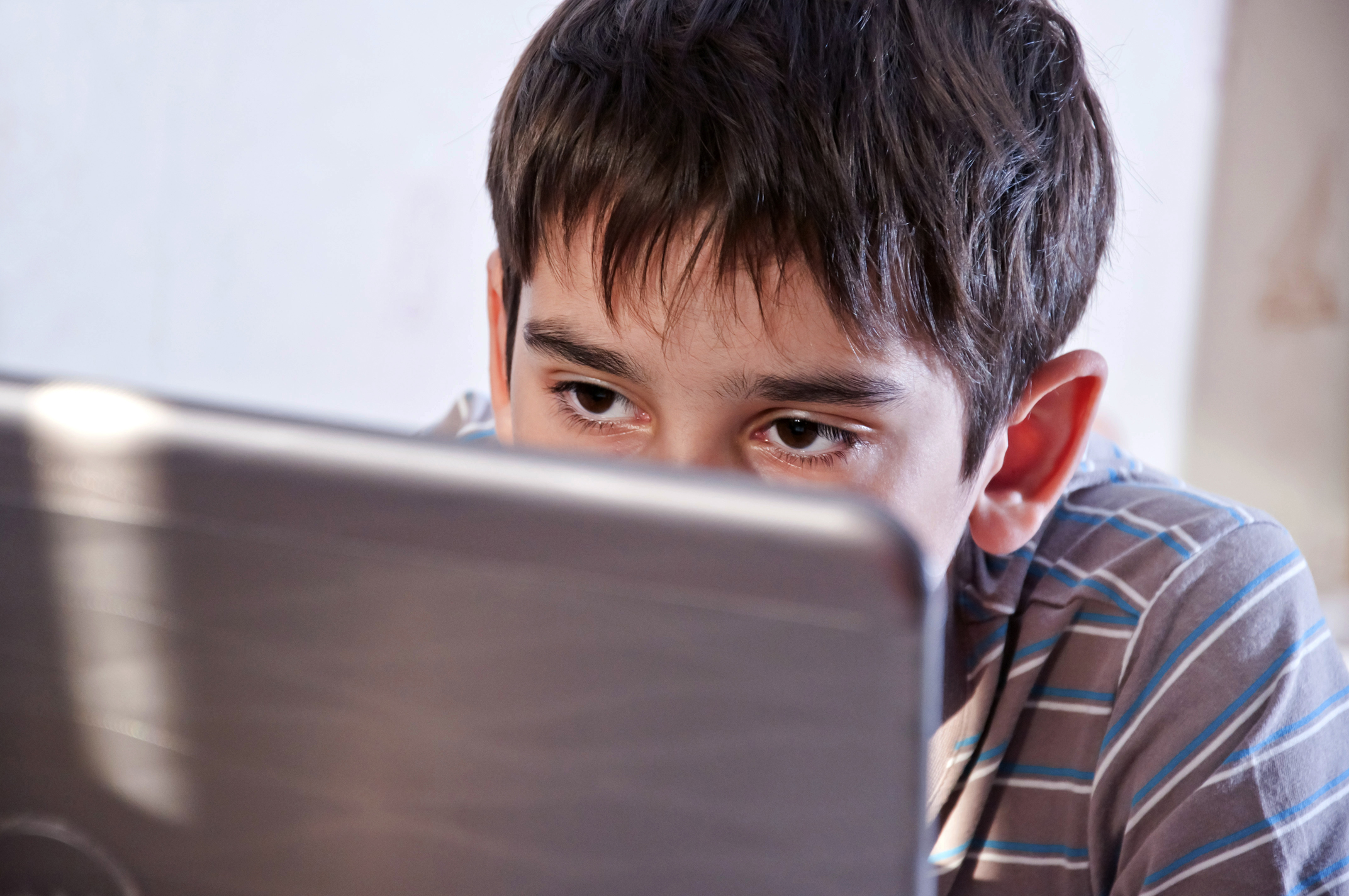 boy playing in the computer